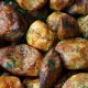 Baked Potatoes With Rosemary Garnish