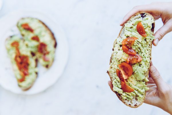 avocado toast, flatlay, hand