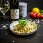 white ceramic plate with food on black table