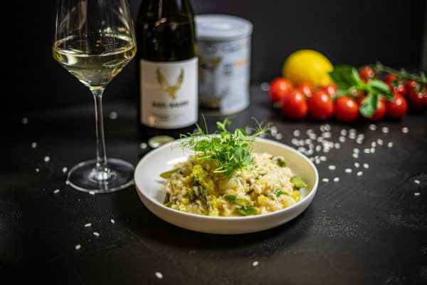 white ceramic plate with food on black table