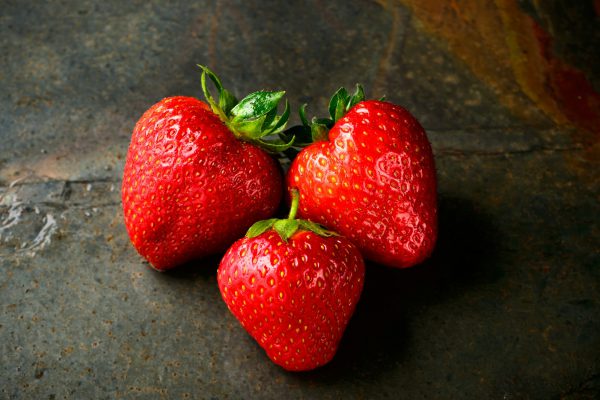 three red strawberries