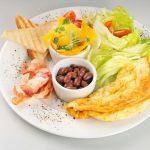 a white plate topped with lots of food