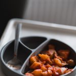 sliced carrots in black ceramic bowl