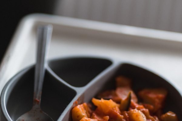 sliced carrots in black ceramic bowl