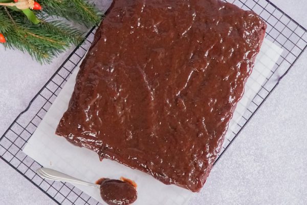 chocolate cake on white and blue checkered textile