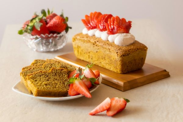 sliced bread with strawberry on white ceramic plate