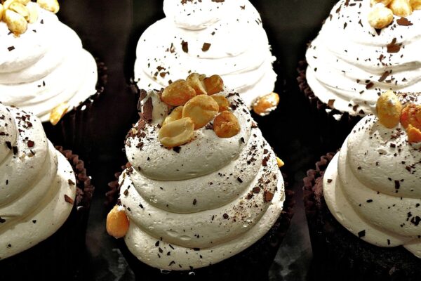 chocolate cupcake, whipped cream, peanuts