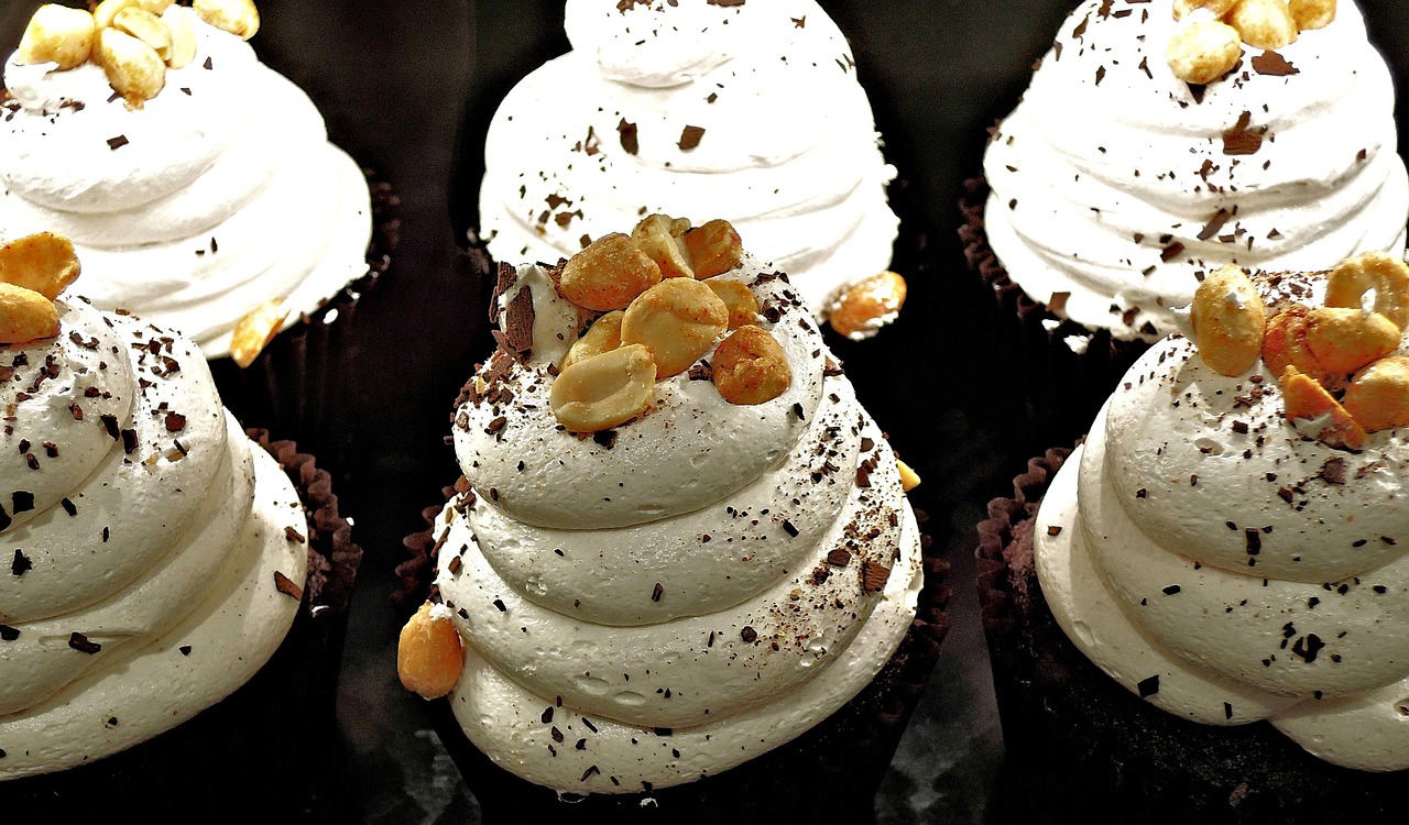 chocolate cupcake, whipped cream, peanuts