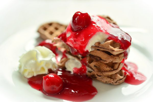 waffles, chocolate wafers, cherry sauce