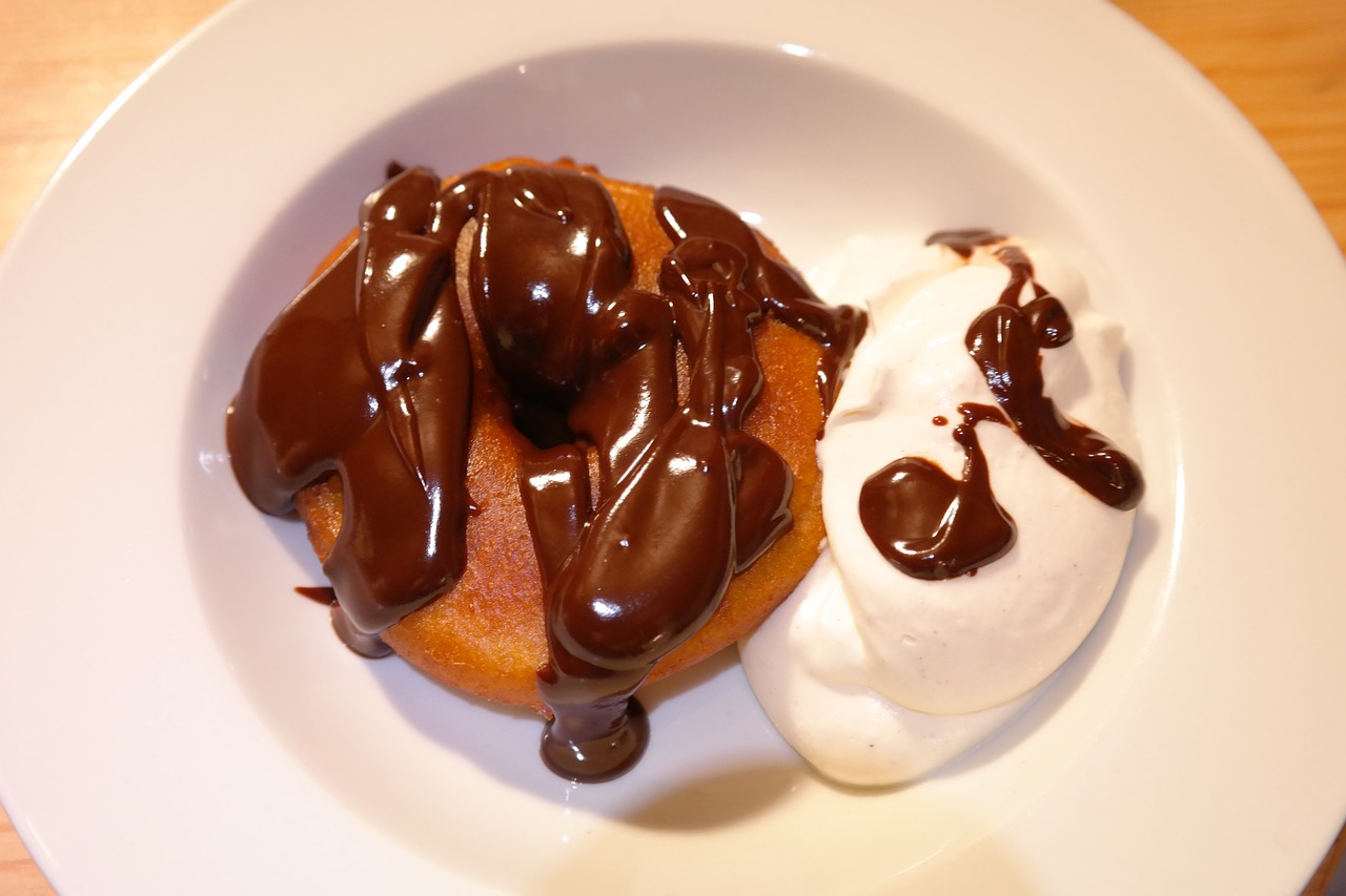 apple fritters, chocolate sauce, cream