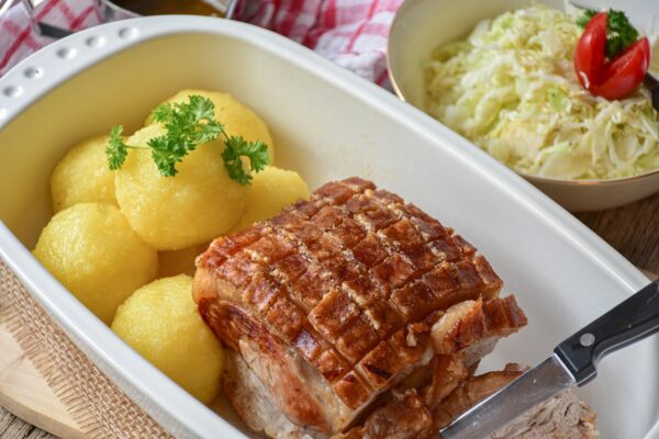 roast pork, dumplings, coleslaw